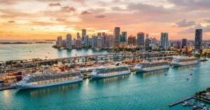 Cruise ships docked in front of the Miami skyline